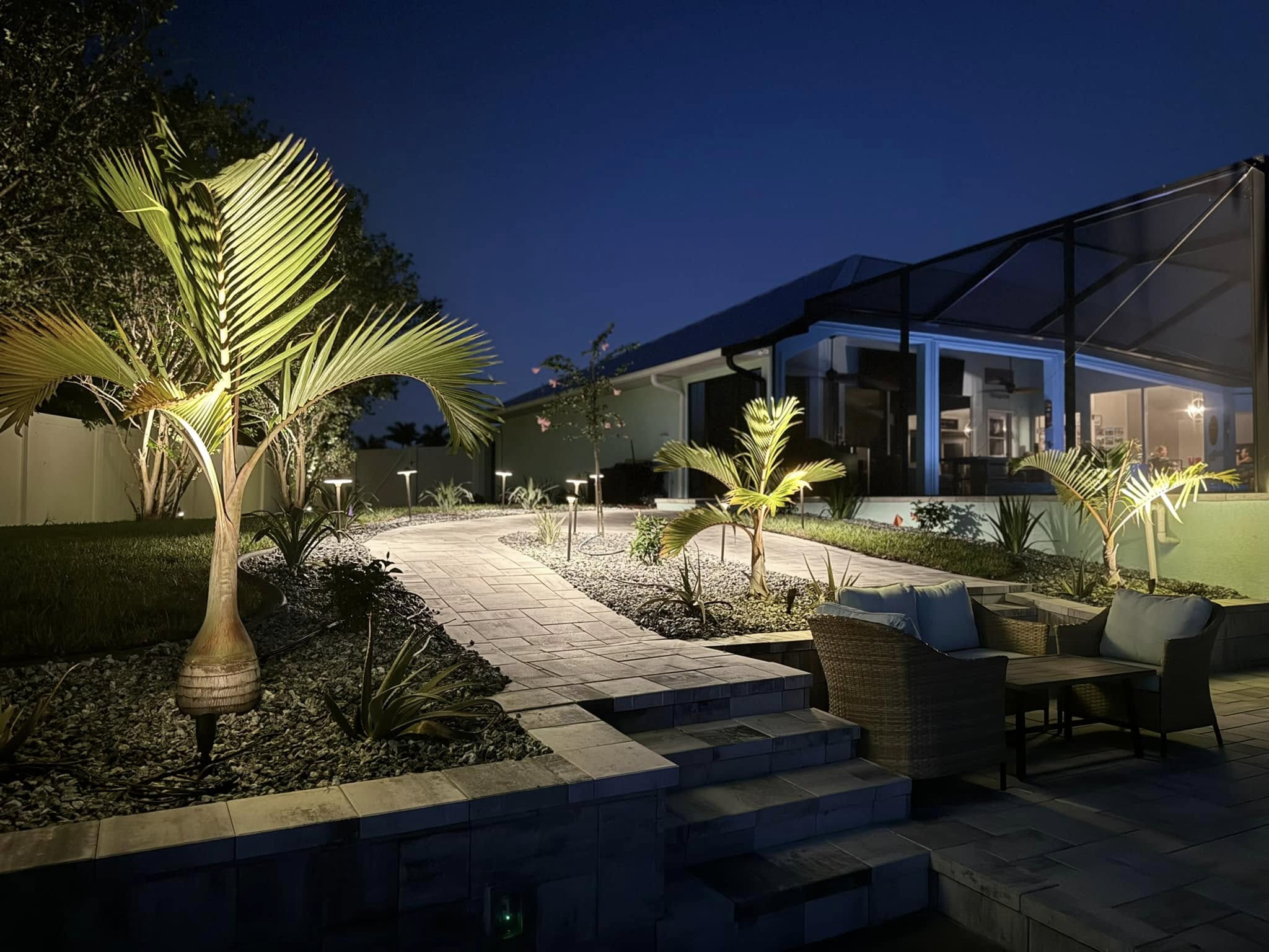 Low-voltage landscape lighting installation in progress